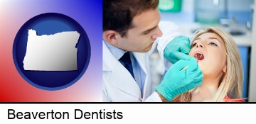a dentist examining teeth in Beaverton, OR