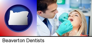 Beaverton, Oregon - a dentist examining teeth