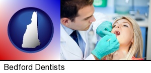 Bedford, New Hampshire - a dentist examining teeth