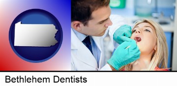 a dentist examining teeth in Bethlehem, PA