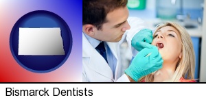 Bismarck, North Dakota - a dentist examining teeth