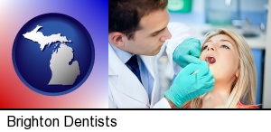 Brighton, Michigan - a dentist examining teeth