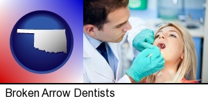Broken Arrow, Oklahoma - a dentist examining teeth