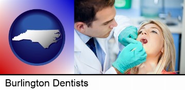 a dentist examining teeth in Burlington, NC