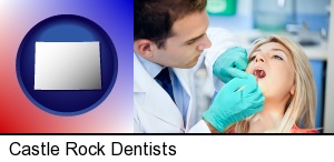 Castle Rock, Colorado - a dentist examining teeth