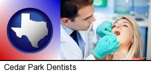 Cedar Park, Texas - a dentist examining teeth