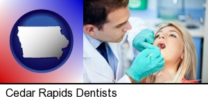 Cedar Rapids, Iowa - a dentist examining teeth