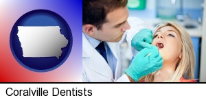Coralville, Iowa - a dentist examining teeth