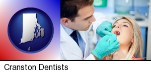 Cranston, Rhode Island - a dentist examining teeth