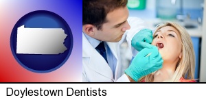 Doylestown, Pennsylvania - a dentist examining teeth