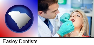 Easley, South Carolina - a dentist examining teeth