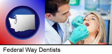 a dentist examining teeth in Federal Way, WA