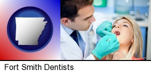 Fort Smith, Arkansas - a dentist examining teeth