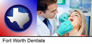 a dentist examining teeth in Fort Worth, TX