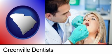 a dentist examining teeth in Greenville, SC