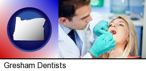 Gresham, Oregon - a dentist examining teeth