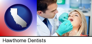 a dentist examining teeth in Hawthorne, CA