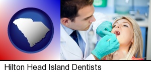Hilton Head Island, South Carolina - a dentist examining teeth