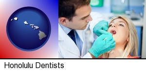 Honolulu, Hawaii - a dentist examining teeth