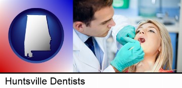 a dentist examining teeth in Huntsville, AL
