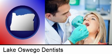 a dentist examining teeth in Lake Oswego, OR