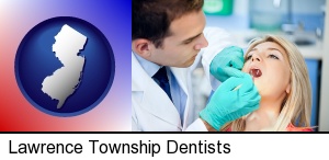 a dentist examining teeth in Lawrence Township, NJ
