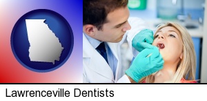 Lawrenceville, Georgia - a dentist examining teeth