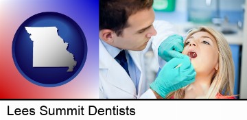 a dentist examining teeth in Lees Summit, MO