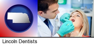 Lincoln, Nebraska - a dentist examining teeth
