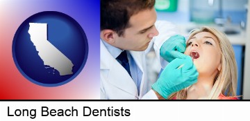 a dentist examining teeth in Long Beach, CA