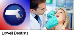 Lowell, Massachusetts - a dentist examining teeth