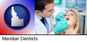 Meridian, Idaho - a dentist examining teeth
