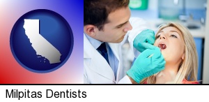 Milpitas, California - a dentist examining teeth