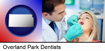 a dentist examining teeth in Overland Park, KS