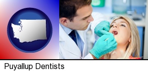 Puyallup, Washington - a dentist examining teeth