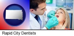 Rapid City, South Dakota - a dentist examining teeth