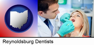 a dentist examining teeth in Reynoldsburg, OH