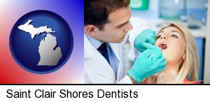 a dentist examining teeth in Saint Clair Shores, MI