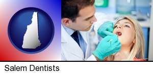 Salem, New Hampshire - a dentist examining teeth