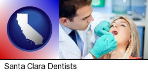 a dentist examining teeth in Santa Clara, CA