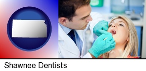 Shawnee, Kansas - a dentist examining teeth