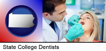 a dentist examining teeth in State College, PA