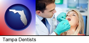 Tampa, Florida - a dentist examining teeth
