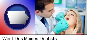 West Des Moines, Iowa - a dentist examining teeth