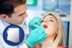 arizona map icon and a dentist examining teeth