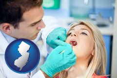 new-jersey map icon and a dentist examining teeth