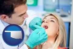 a dentist examining teeth - with OK icon