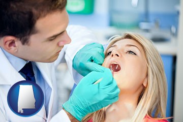 a dentist examining teeth - with Alabama icon