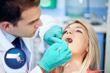 a dentist examining teeth - with Massachusetts icon
