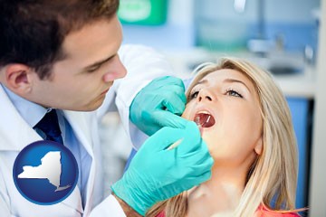 a dentist examining teeth - with New York icon